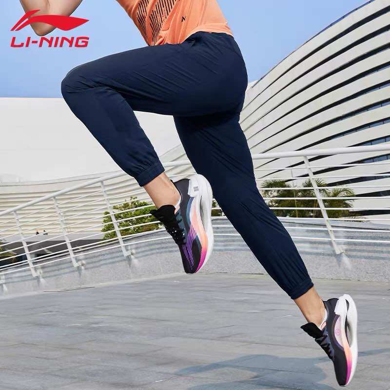 Quần gió nam Lining AYKR859