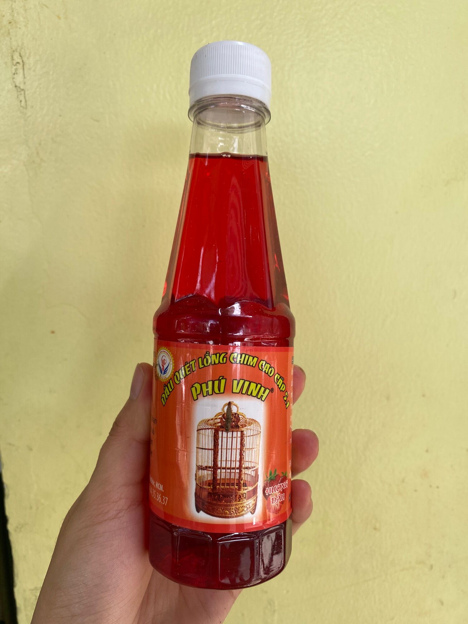 Dầu quét lồng chim phú vinh