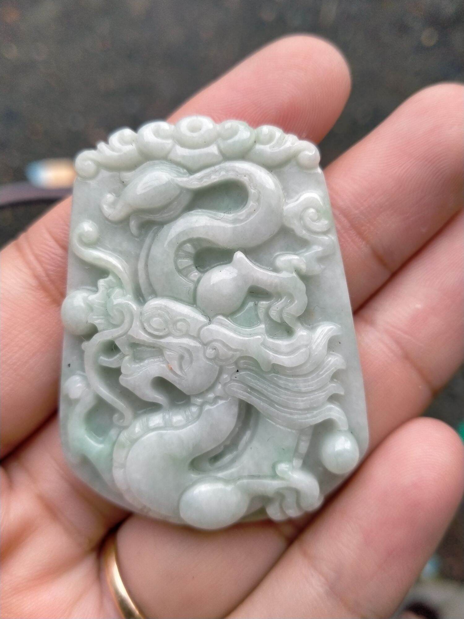 Mặt cẩm thạch chạm rồng