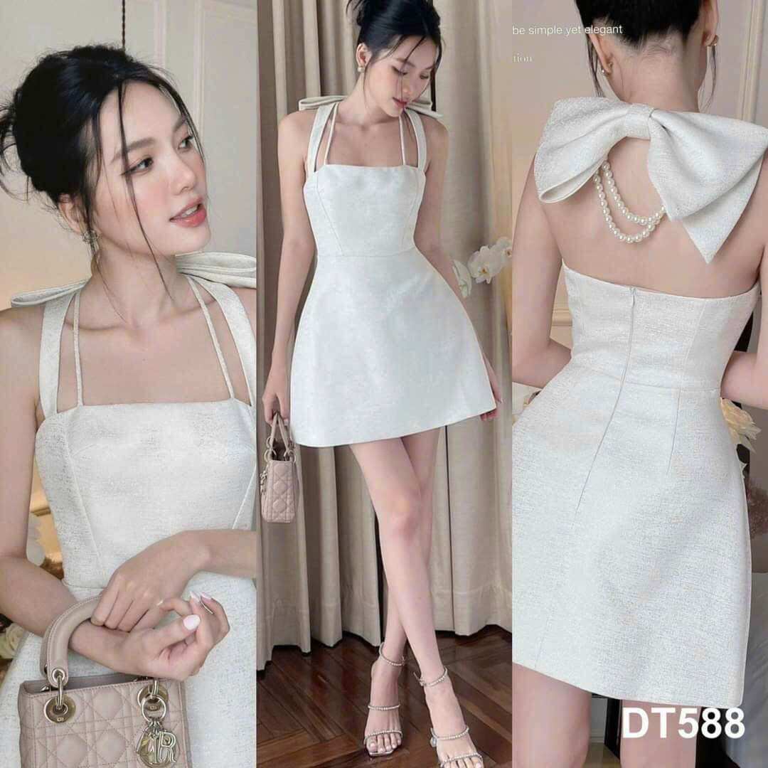 Đầm cổ yếm dáng xoè phối nơ chuỗi ngọc siêu sang
