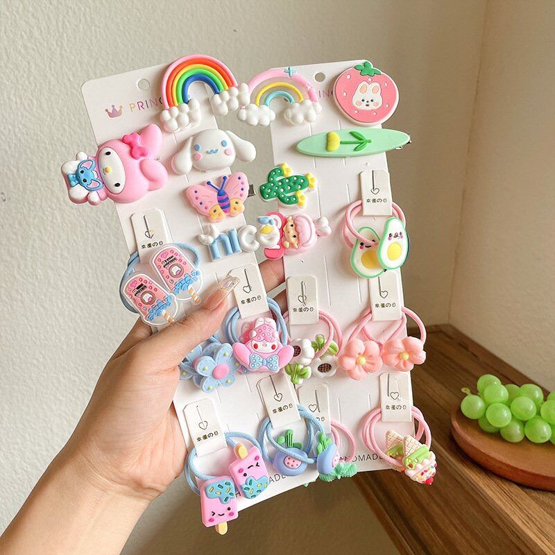 Vỉ 15 buộc tóc kèm cột tóc cho bé