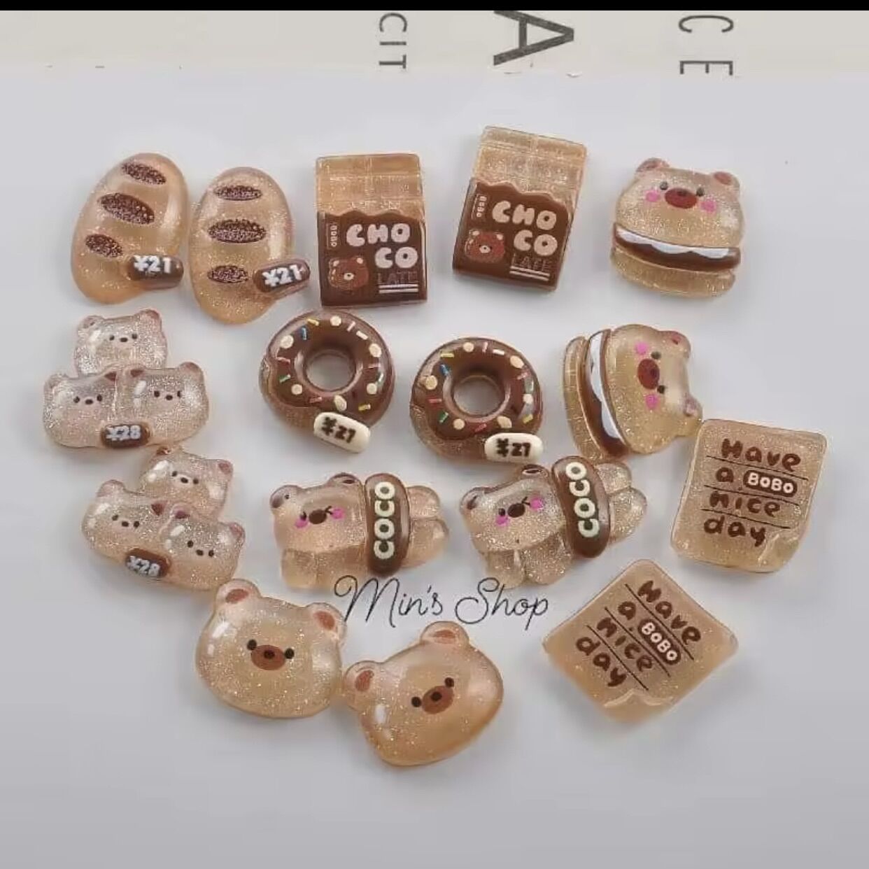 Combo 100 charm gấu dâu lộn xộn
