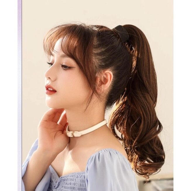 Tóc cột thanh quấn xoăn dài