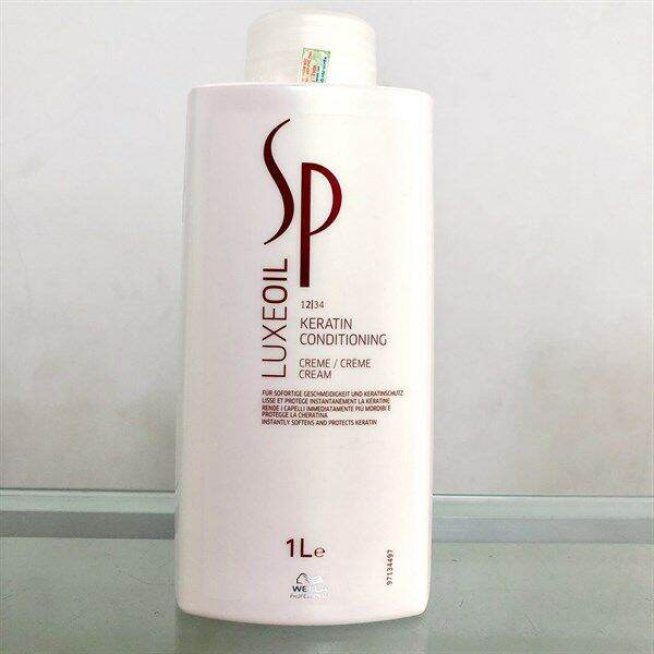 Dầu xả Wella SP Luxe Oil Keratin conditioning siêu mượt cho tóc hư tổn 1000ml cao cấp