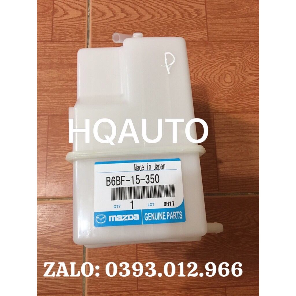 Bình nước phụ ford laser