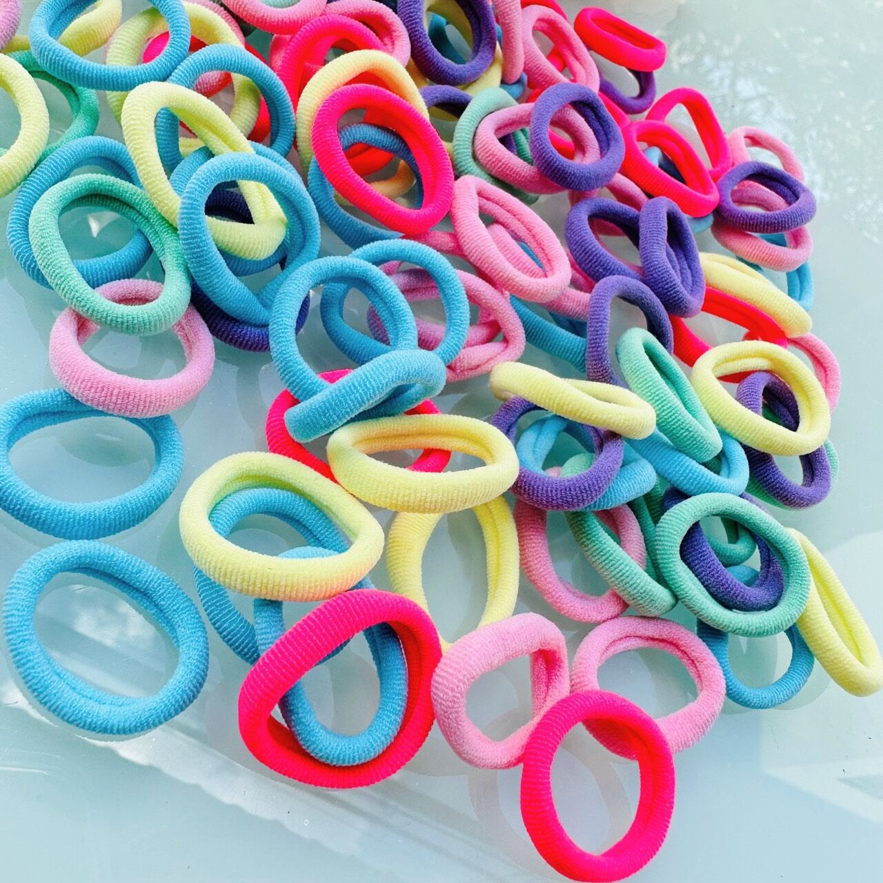 túi 100 dây cột tóc ( màu ngẩu nhiên)