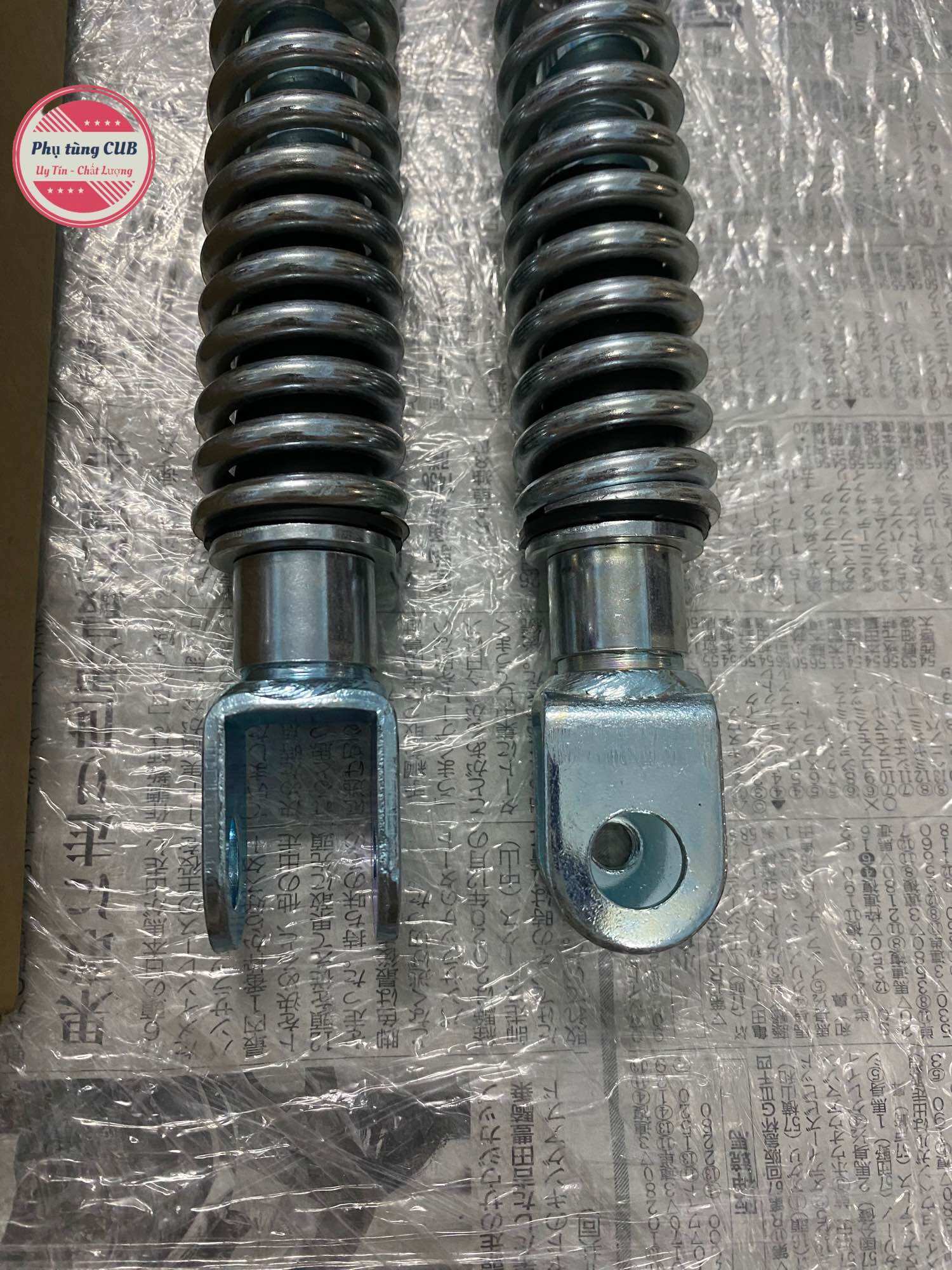 Ty lò xo phuộc trước xe cub 78