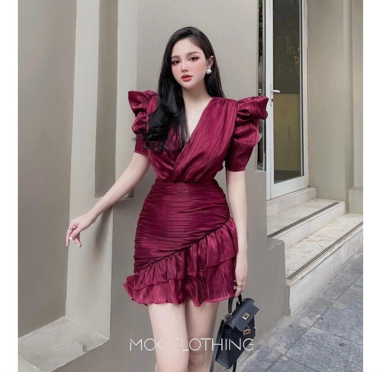 Đầm tay bồng đuôi cá