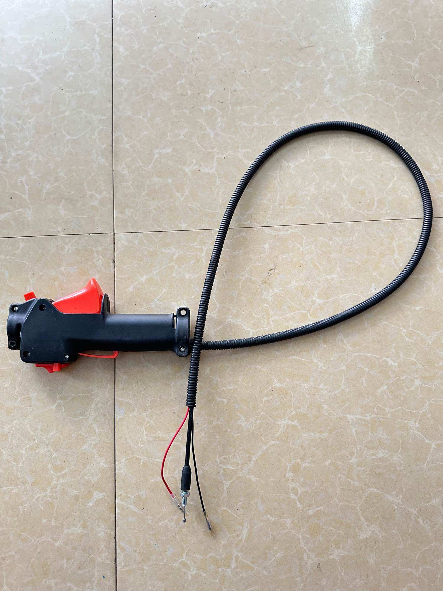 Tay bóp ga máy cắt cỏ đeo lưng