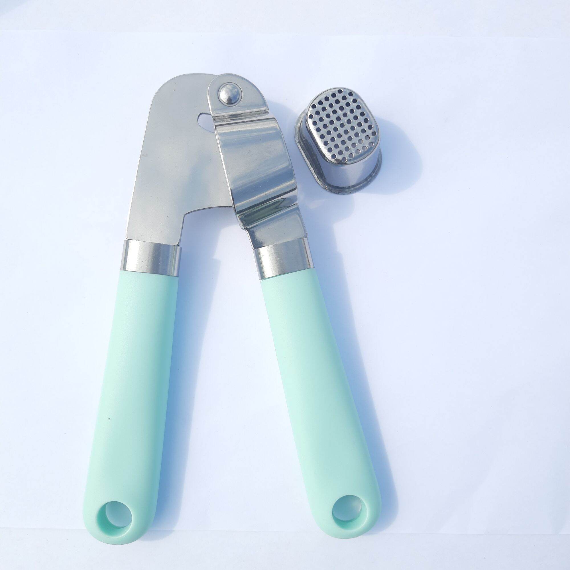 dụng cụ ép tỏi cầm tay