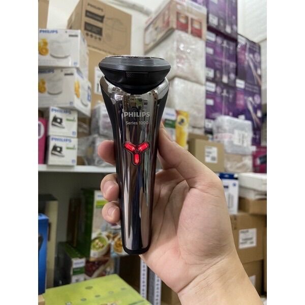 Máy cạo râu du lịch S1301/02, cạo râu dễ dàng và êm ái.