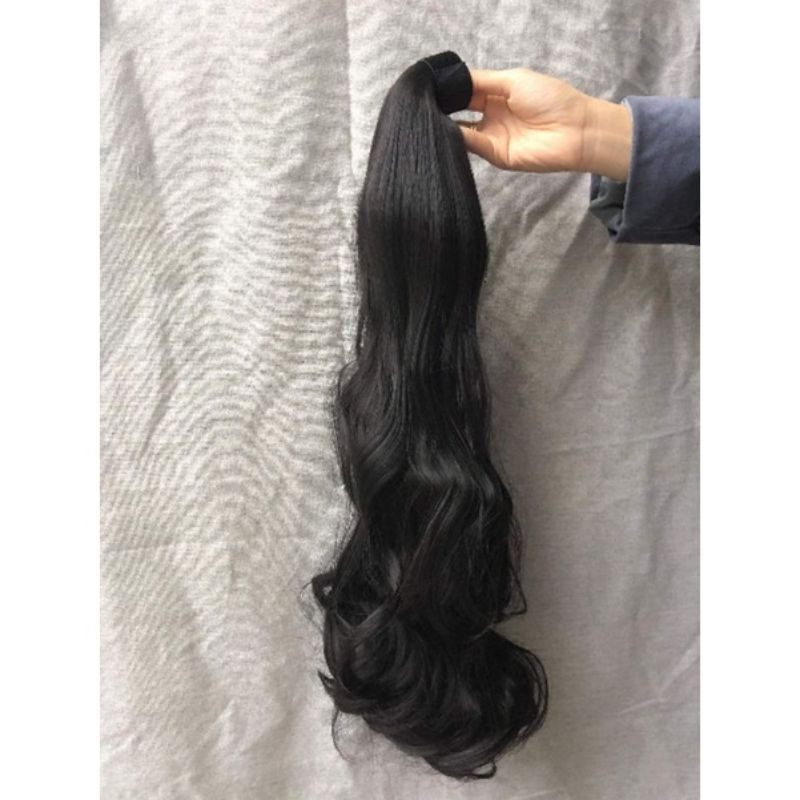 Tóc cột thanh quấn xoăn dài