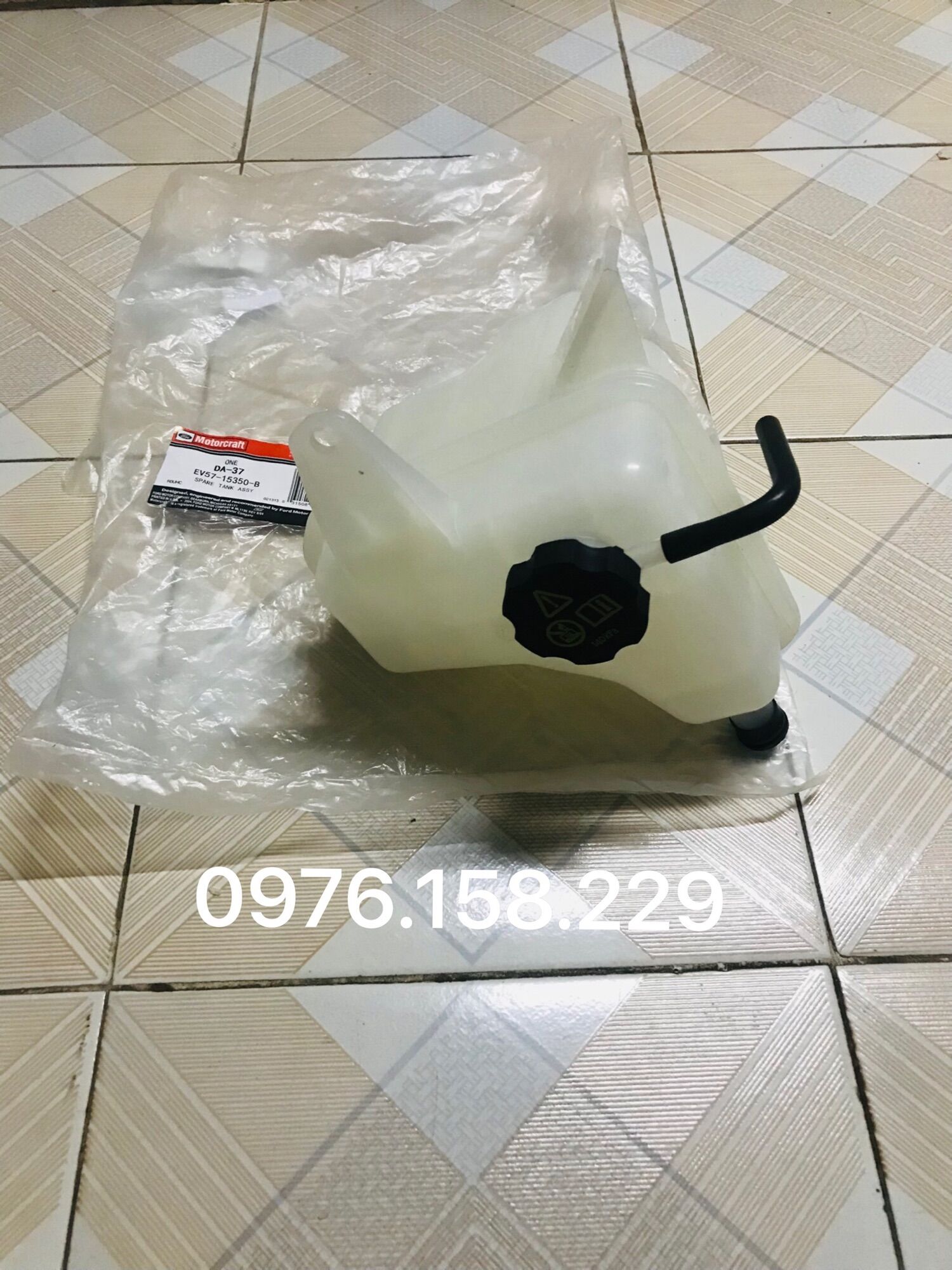 BÌNH NƯỚC PHỤ FORD ESCAPE