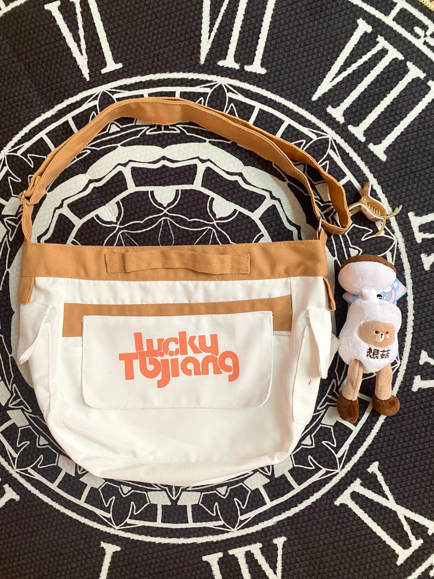 Túi đeo chéo canvas Lucky
