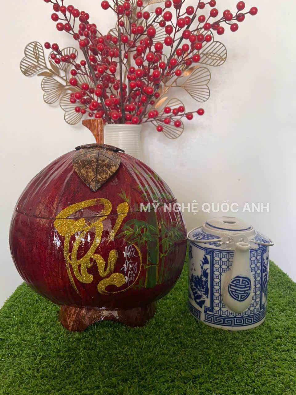 Vỏ dừa ủ ấm trà giử nhiệt vẽ thư pháp