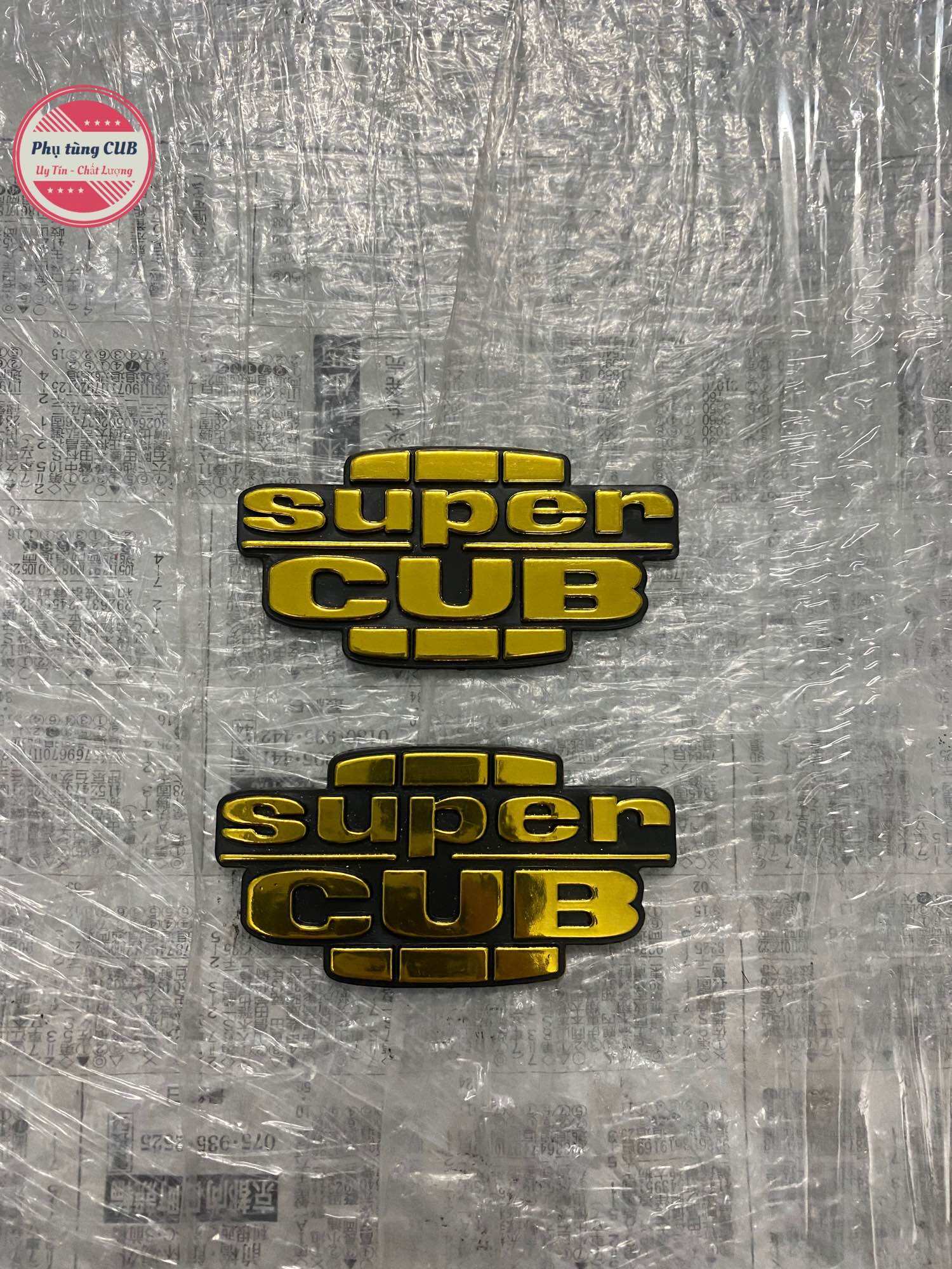 Tem nổi dán cốp xe cub màu vàng xi