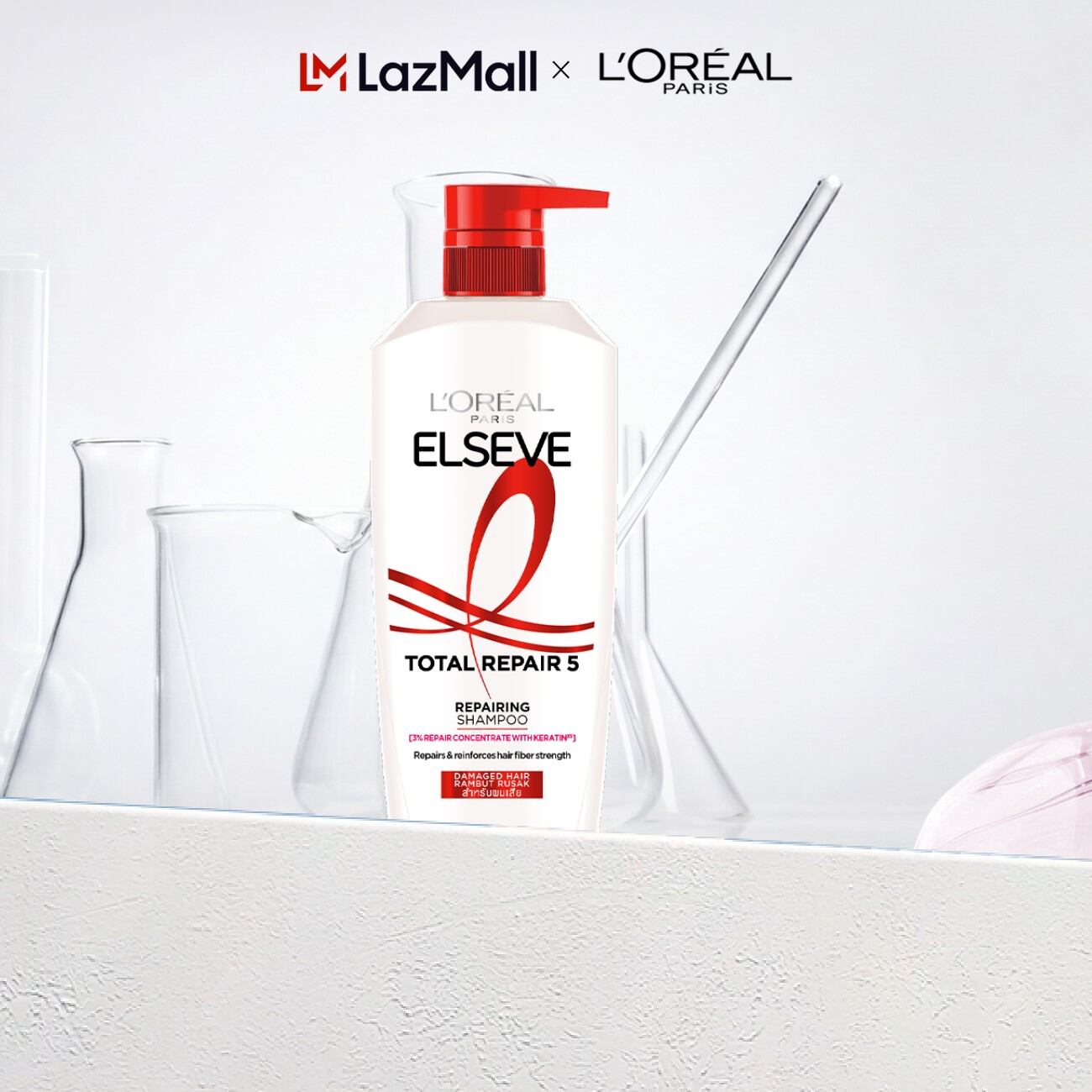 Dầu gội giúp phục hồi tóc hư tổn Elseve Total Repair 5 Filler Repairing Shampoo 620ml