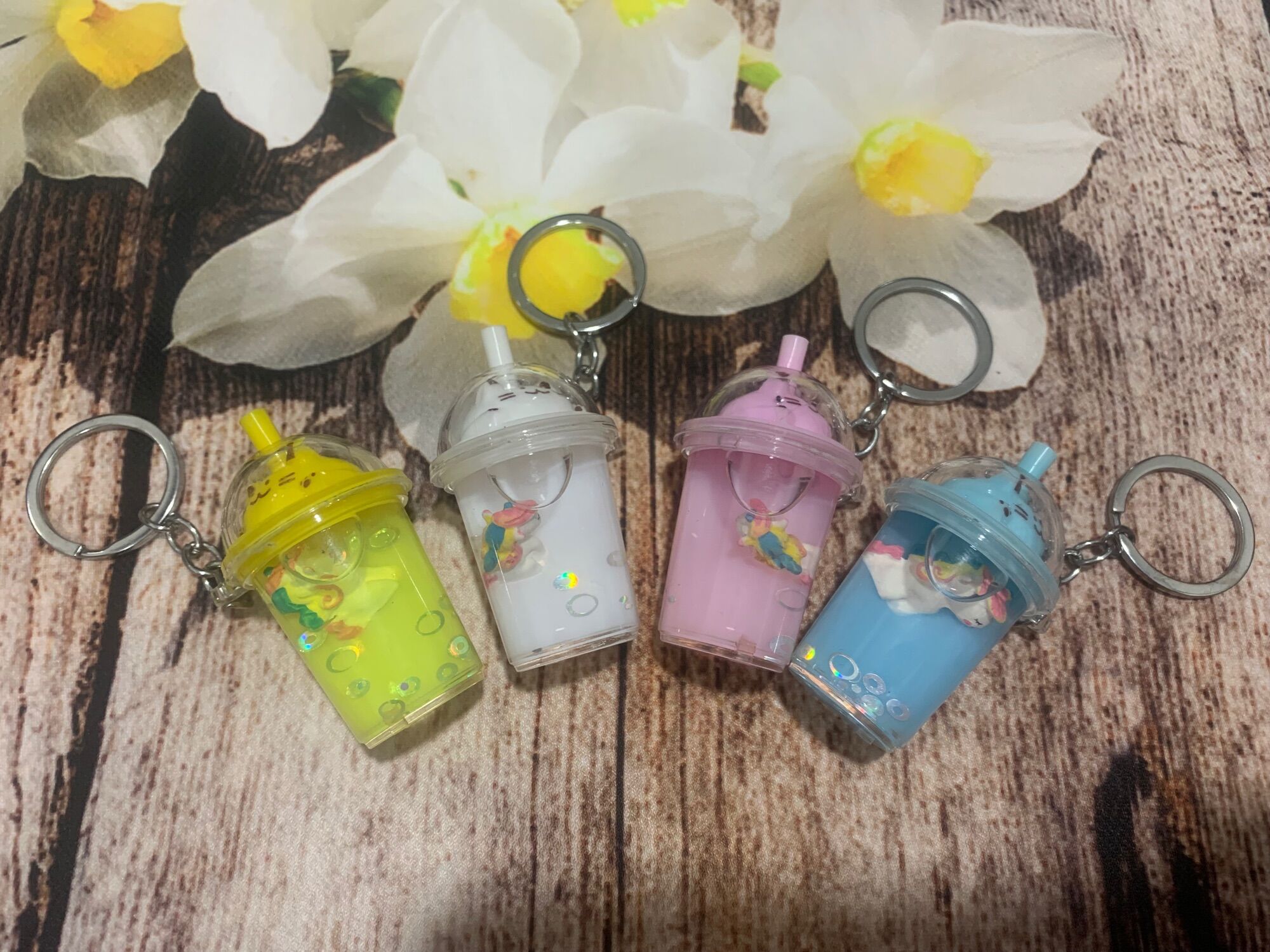 Móc khoá nước chọn mẫu vui lòng nhắn tin cho shop nhé!