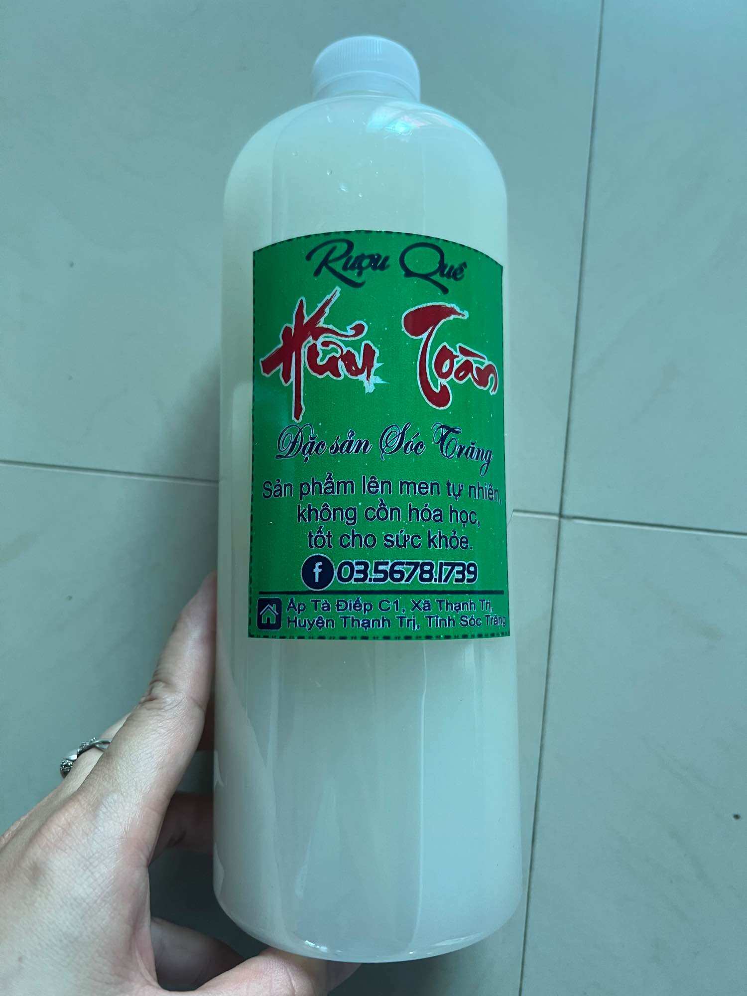 Rượu nếp sữa nhà làm, chai 1 lít 50k