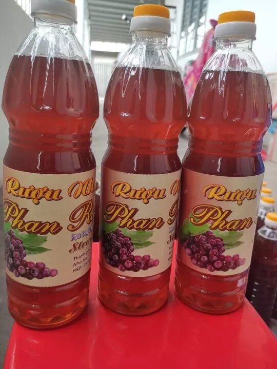 1 lit rựu nho nguyên chất nhà làm