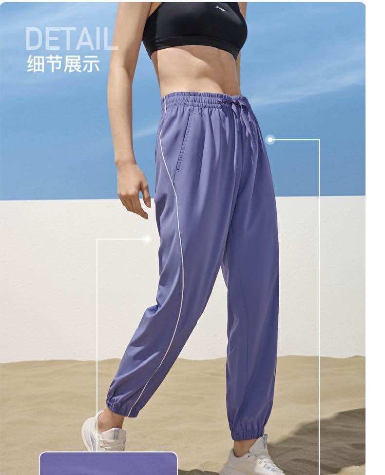 Quần gió thể thao chống nắng nữ Lining AYKT534