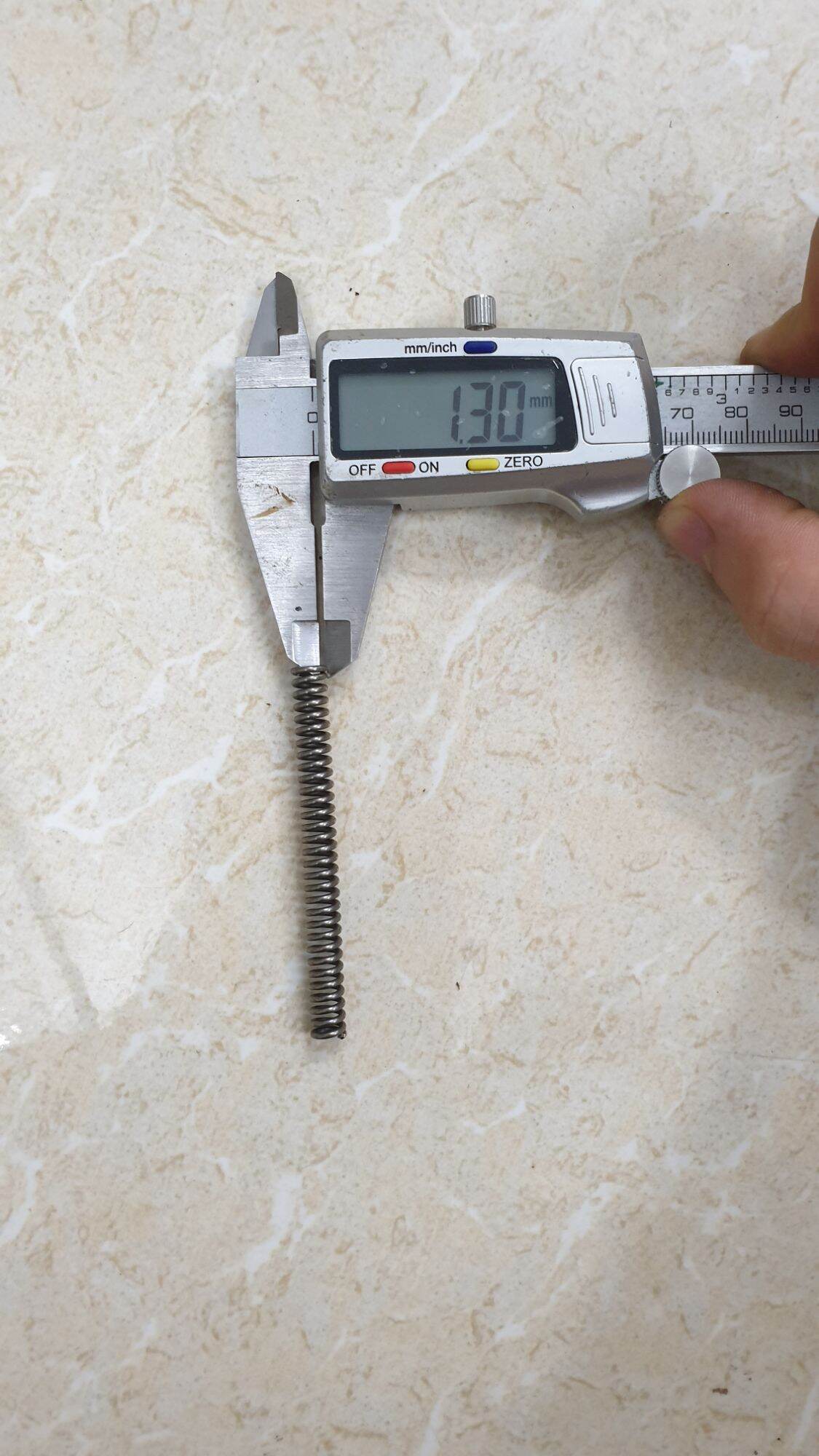 Lò xo phi 7 sợi 1.3 dài 6cm và 7cm
