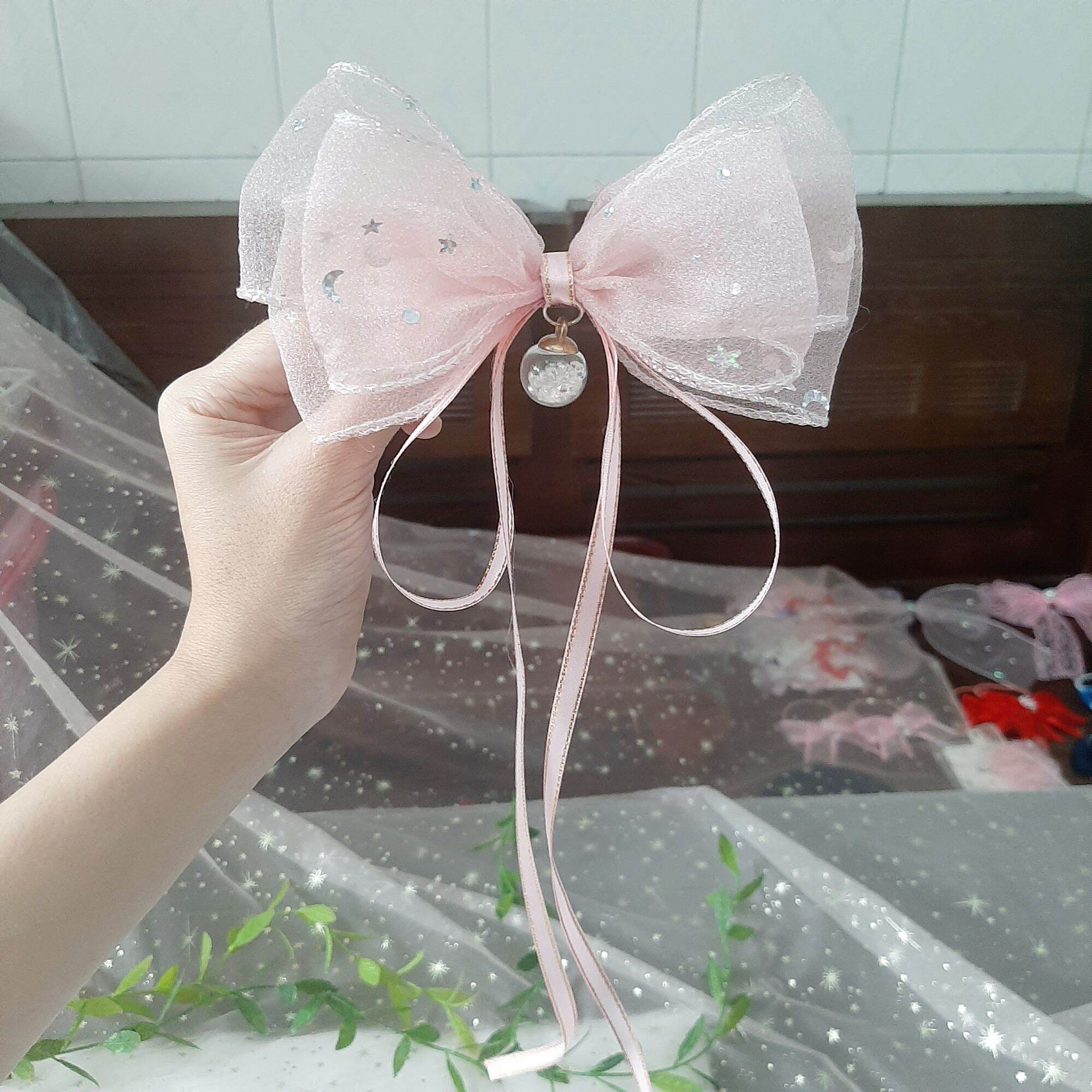 Kẹp tóc nơ trăng sao đính ngọc lấp lánh (mua 10 tặng 1)
