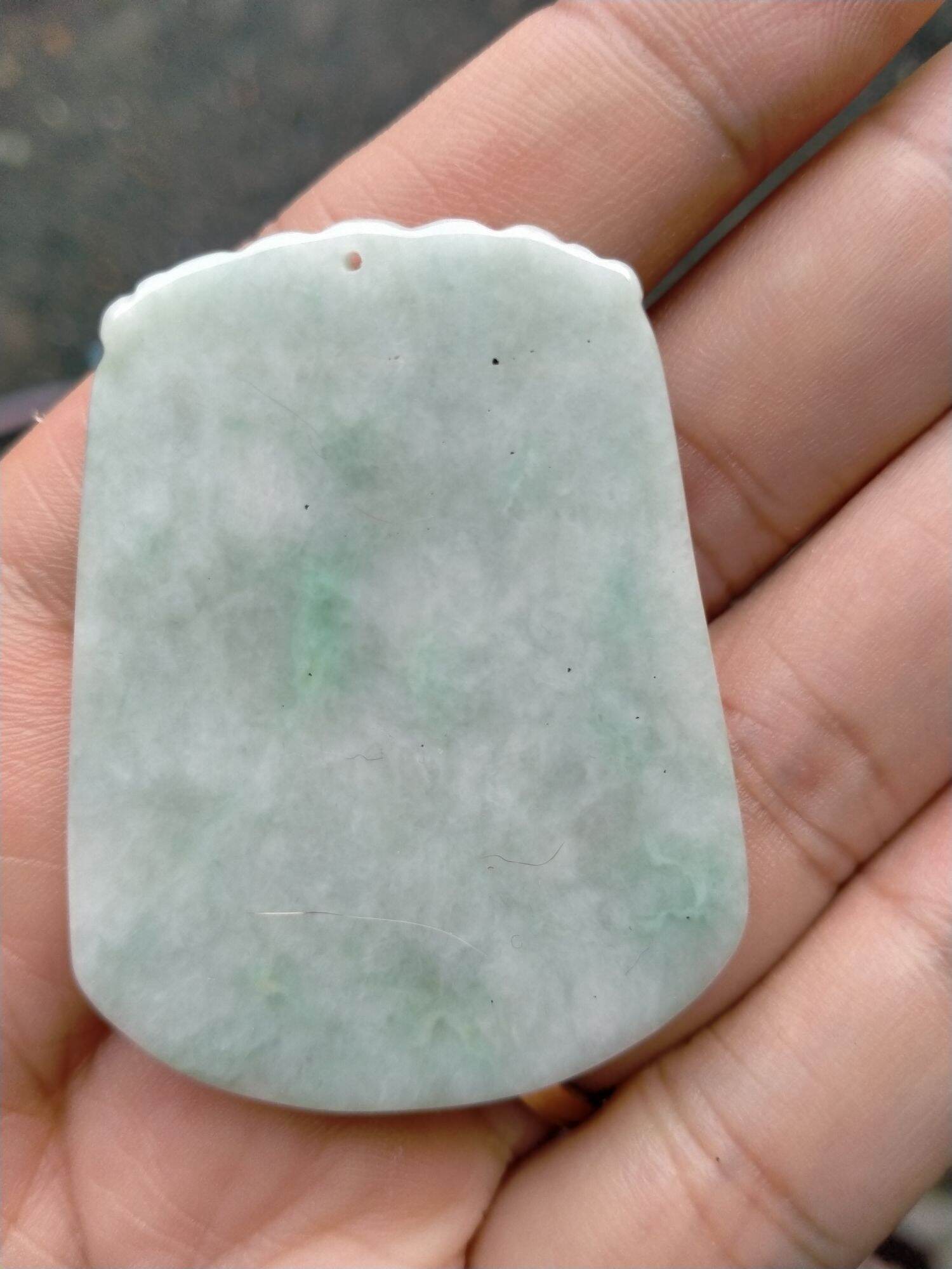 Mặt cẩm thạch chạm rồng