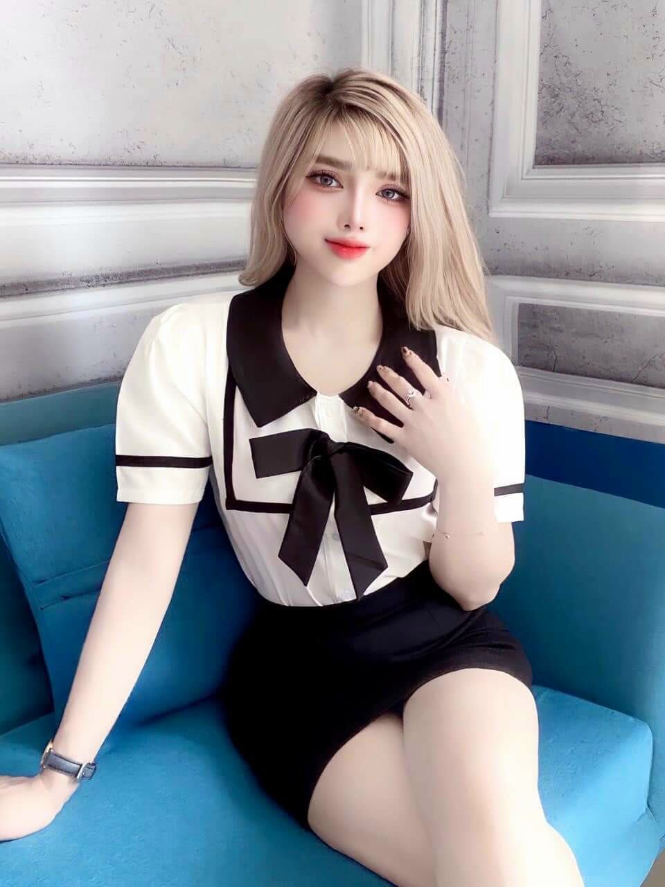 Áo nữ tay ngắn có nơ viền đen vải lụa