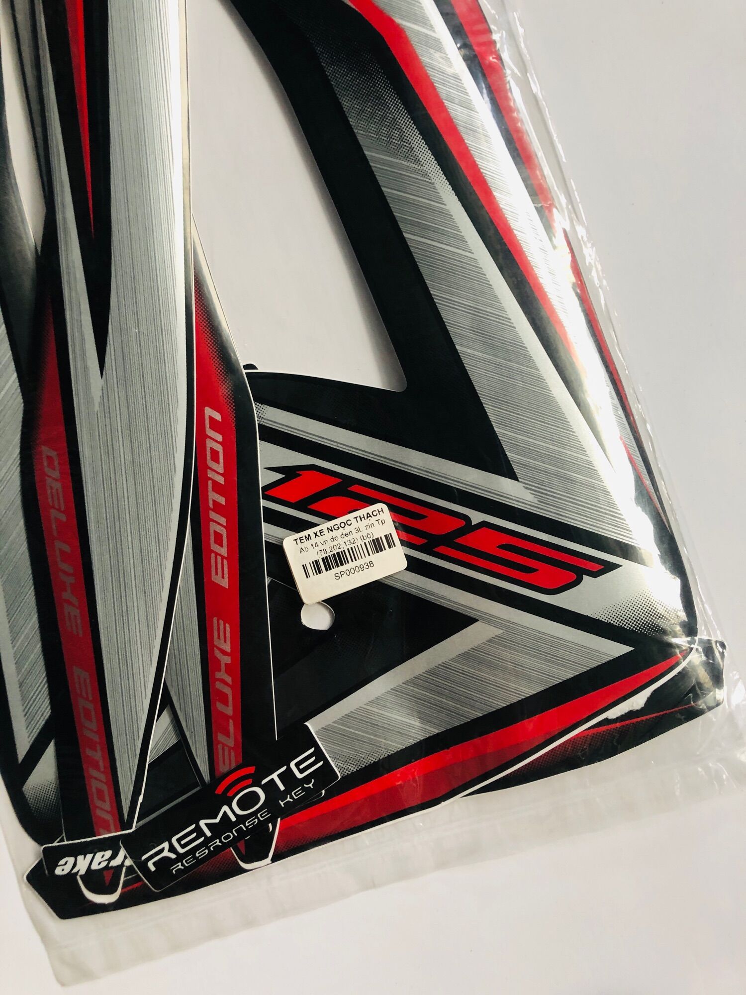 TEM AIRBLADE 125 - 2014 VN ĐỎ ĐEN 3L ZIN