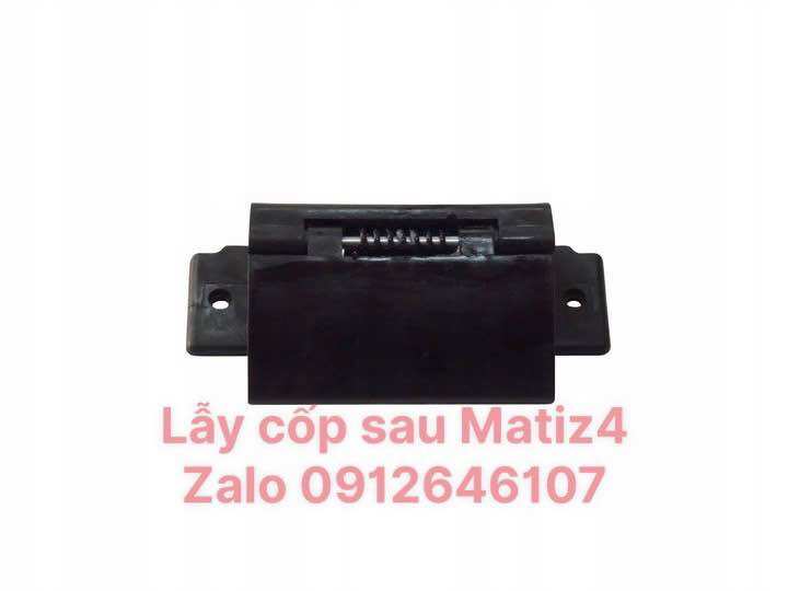 Tay mở cốp sau Spark M300 xịn GM