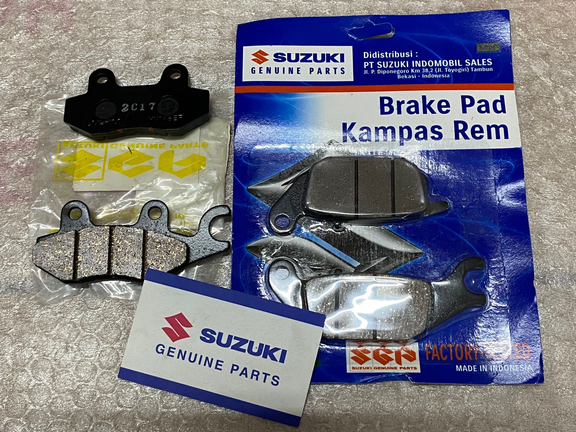 Bố thắng đĩa trước sau axelo 125 suzuki