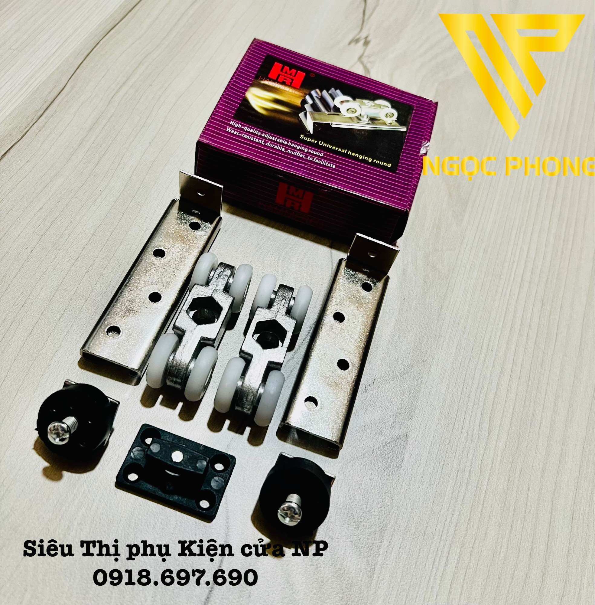 Bộ bánh xe treo cửa lùa nhôm - sắt -gỗ hộp tím