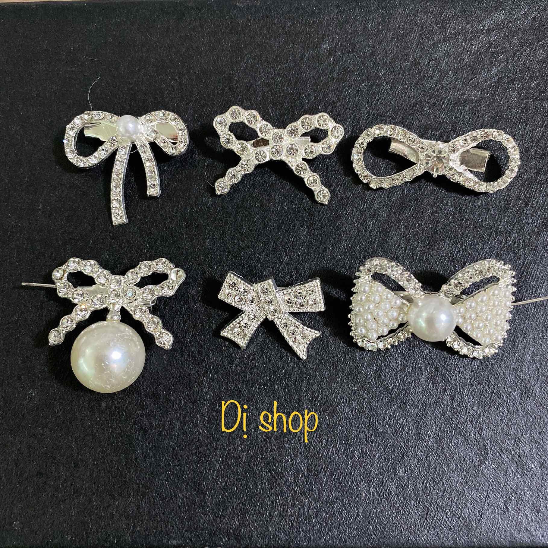 1 tag cài nơ size 2.8cm có ghim cài phía sau