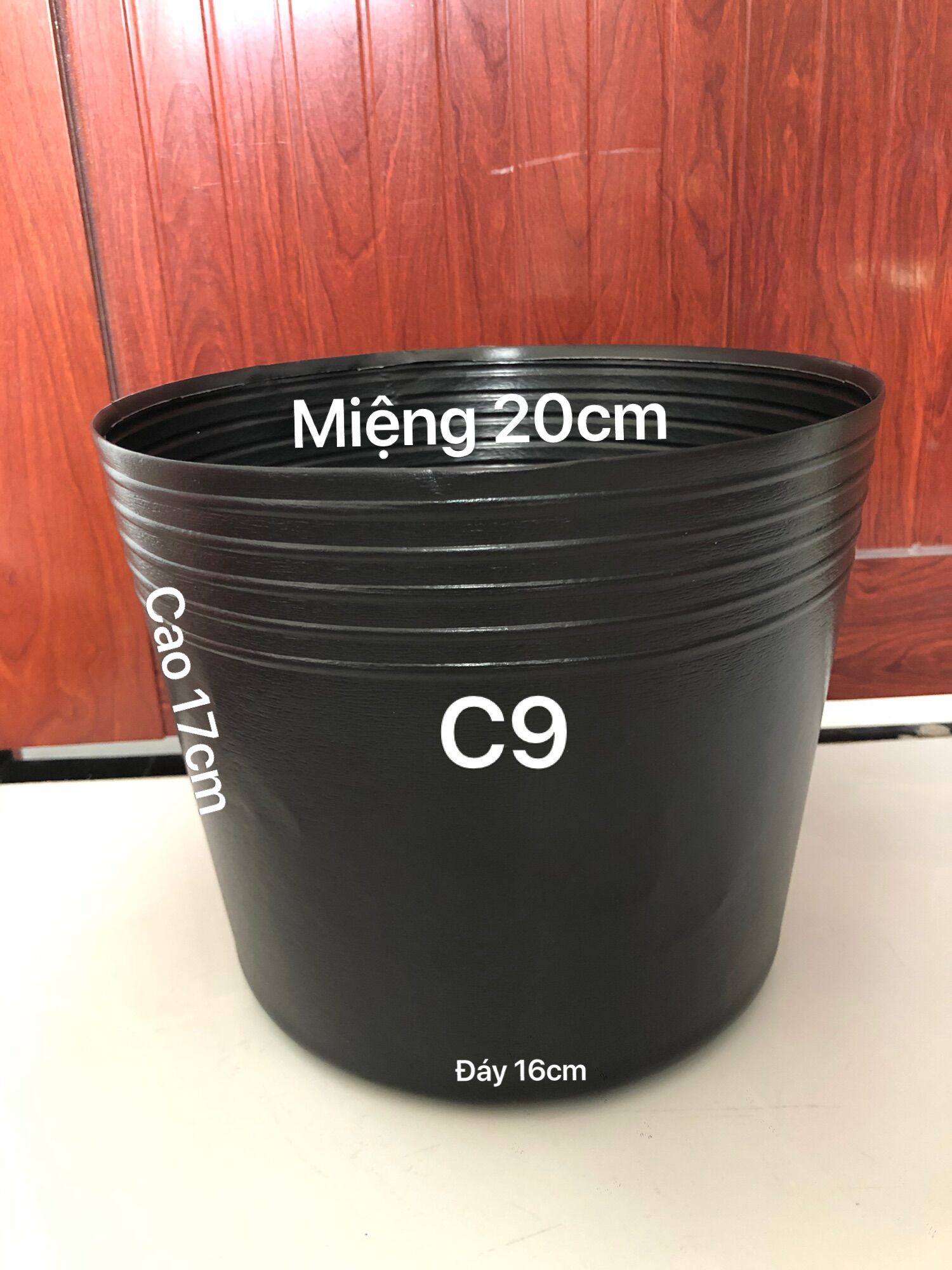 Chậu nhua  trồng cây 50 cái C9 đen dày dặn bóng dẻo