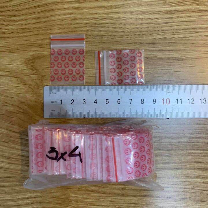 50c túi zip mini miêt mầu hồng hoa văn
