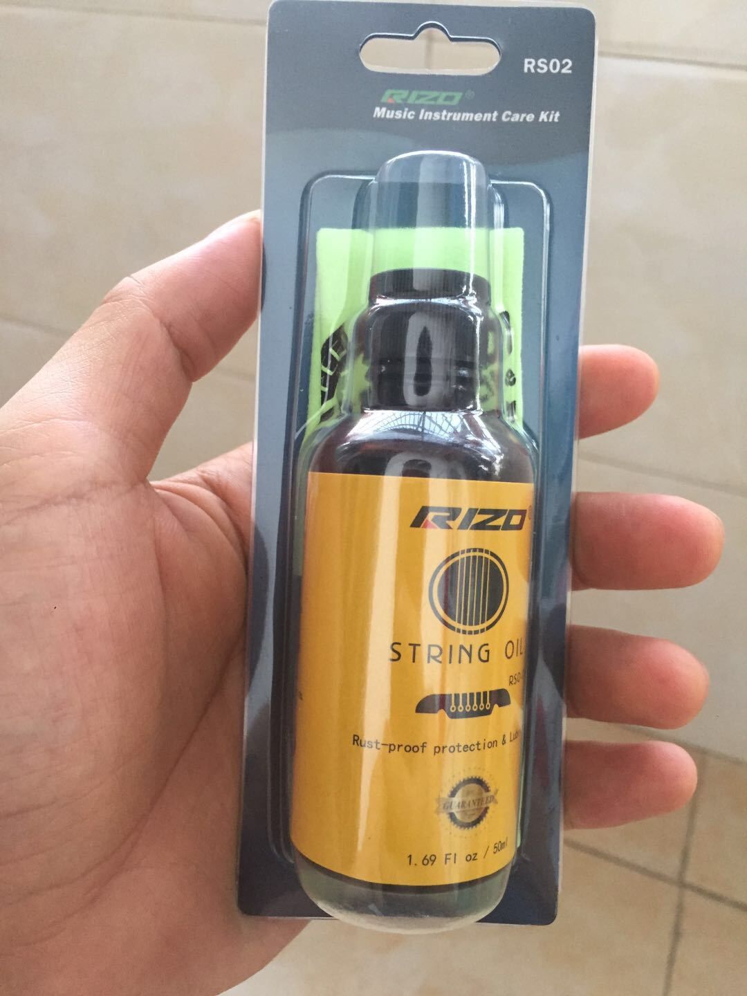 Dầu lau dây đàn Rizo 50ml tặng khăn lau