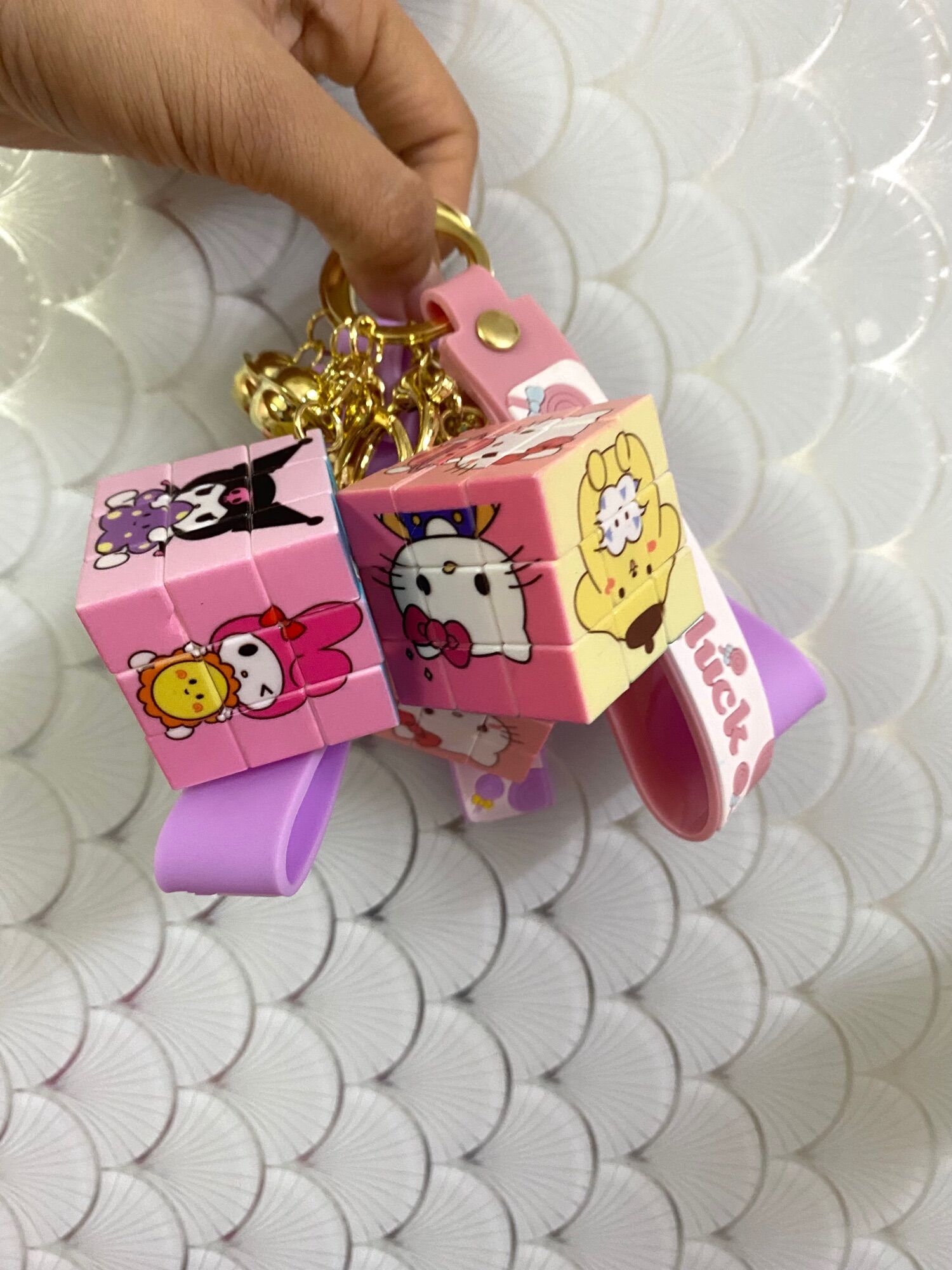 Móc khoá rubik gấu dâu, doraemon, sanrio