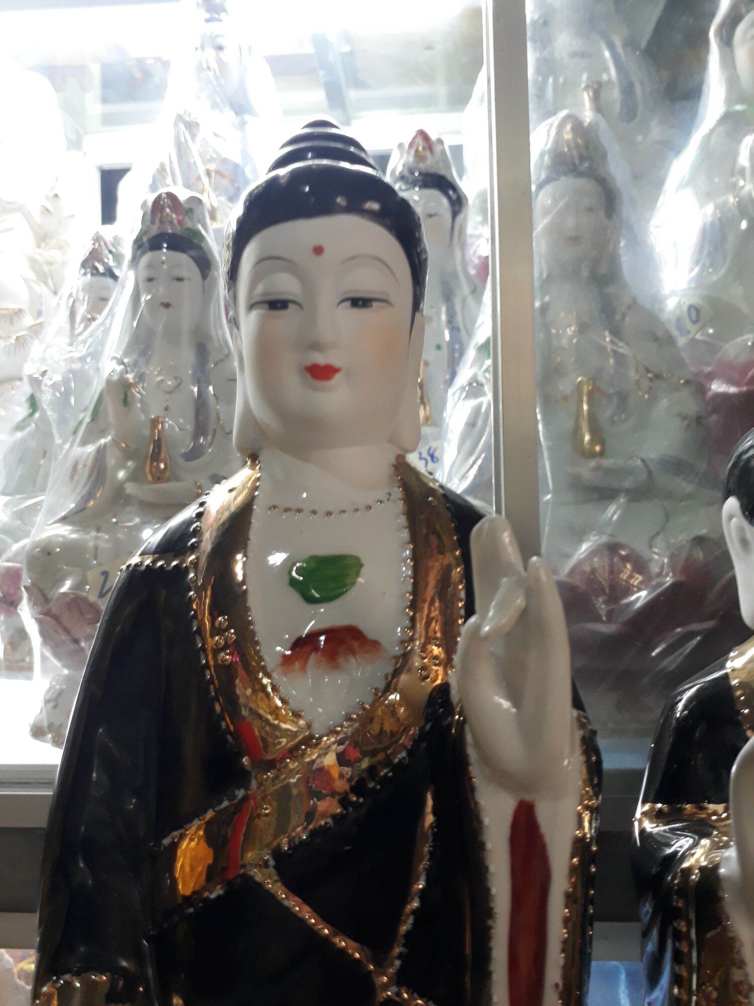 Tượng mẹ  địa  mẫu  sứ