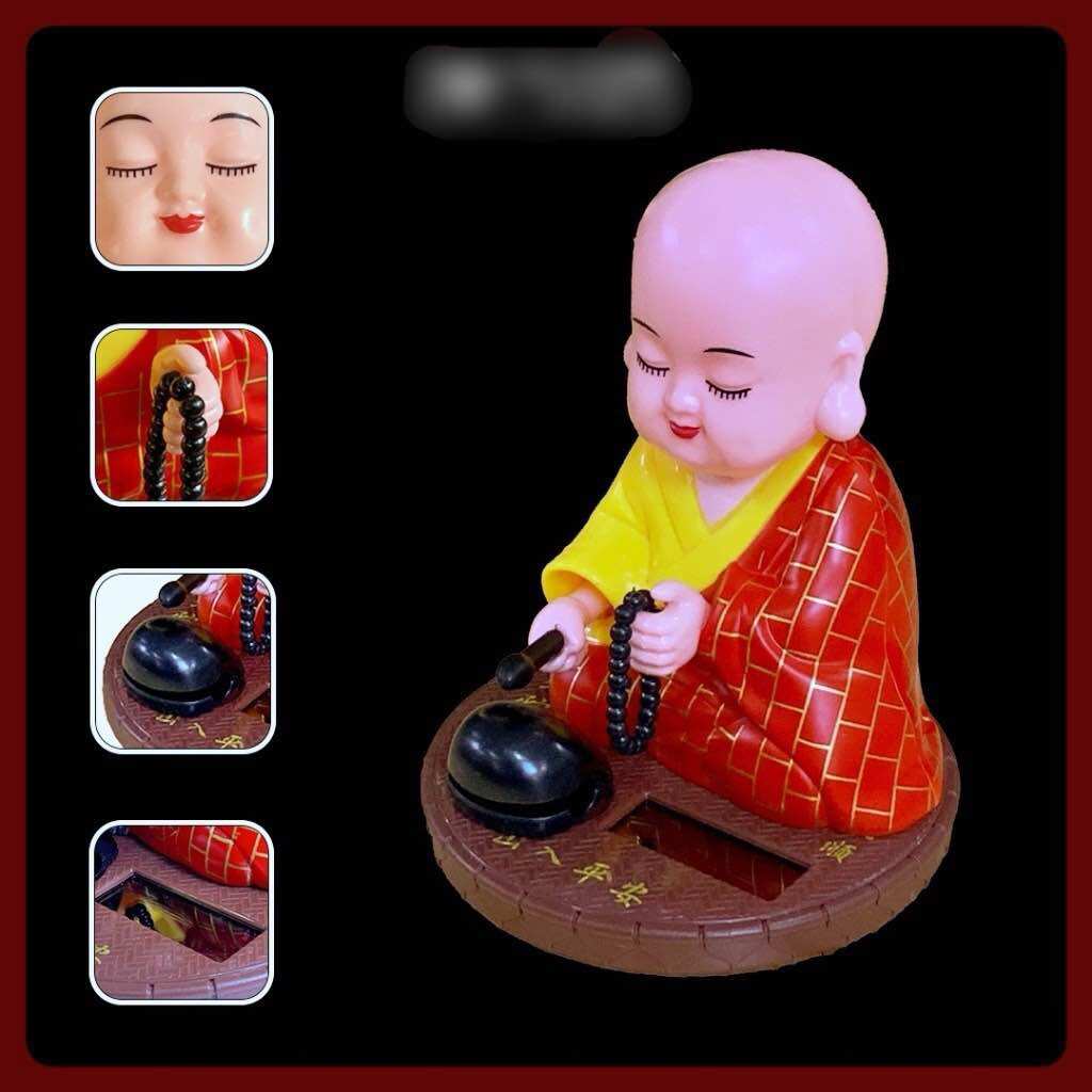 Tượng chú tiểu gõ mõ, gật đầu bằng năng lượng mặt trời