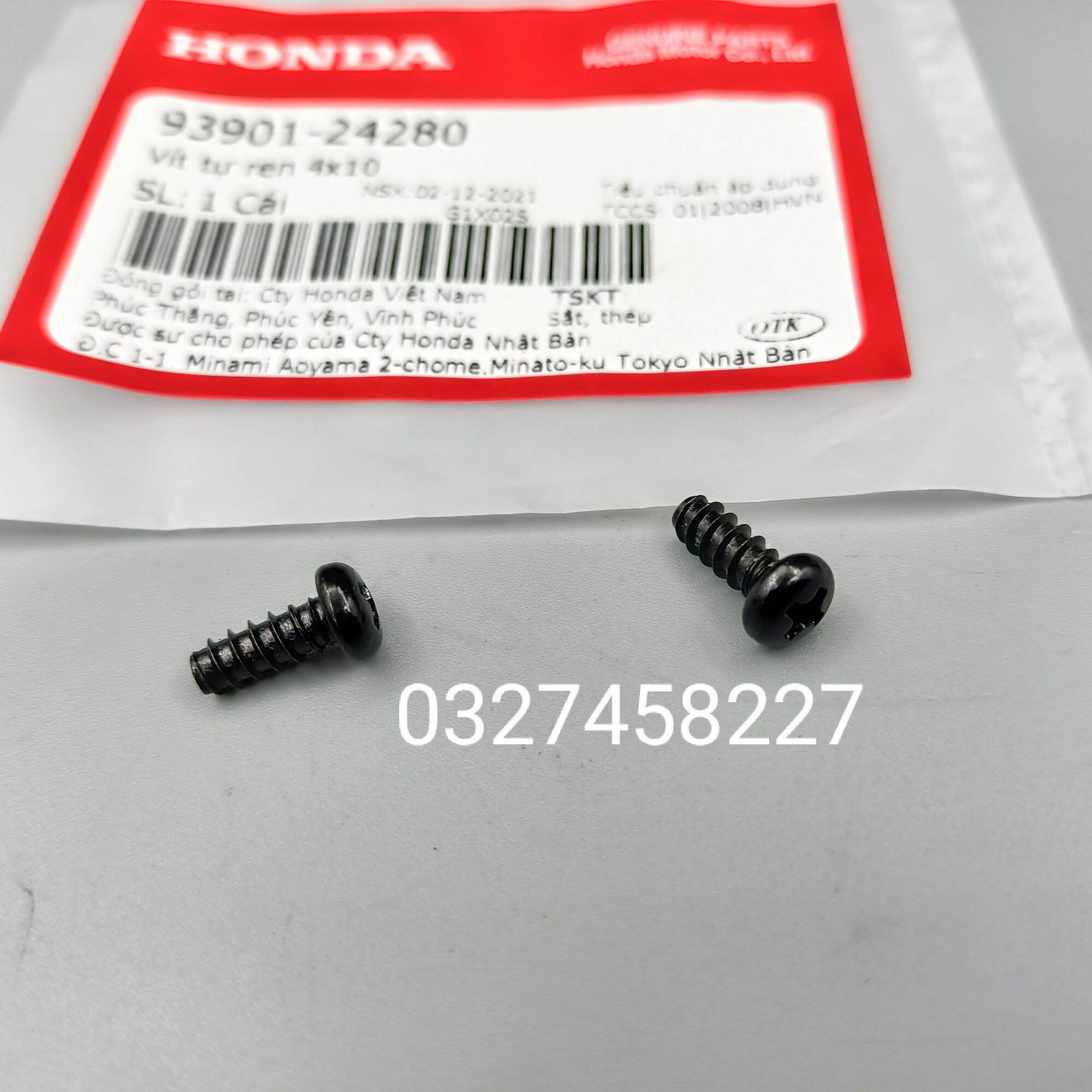 2 ốc bắt mắt mèo ,phản quang trước xe DREAM zin honda vít 4x10