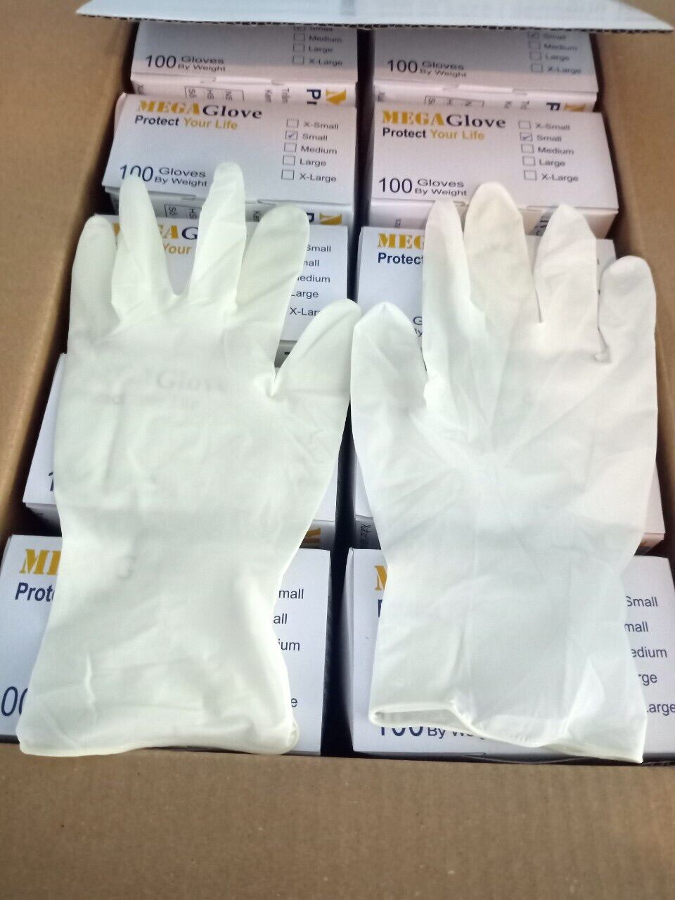 Găng tay y tế latex Mega glove màu trắng kem , hộp 100 chiếc