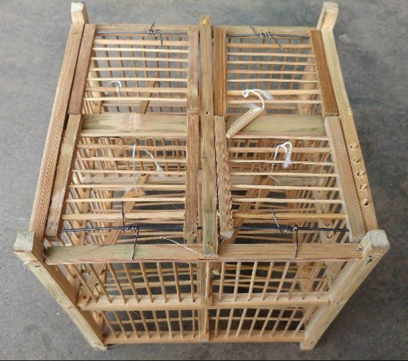 Lồng bẫy chim khuyên 4 cửa chất liệu tre