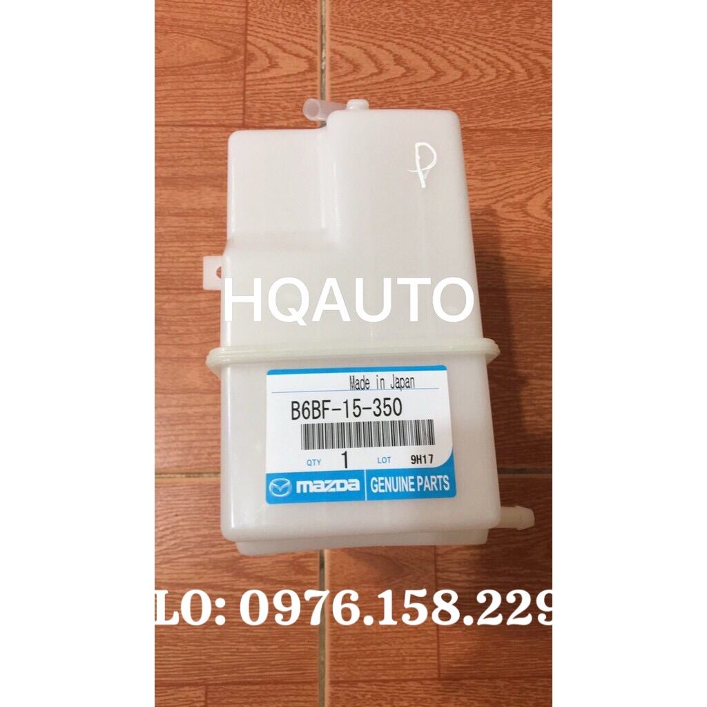 BÌNH NƯỚC PHỤ FORD LASER