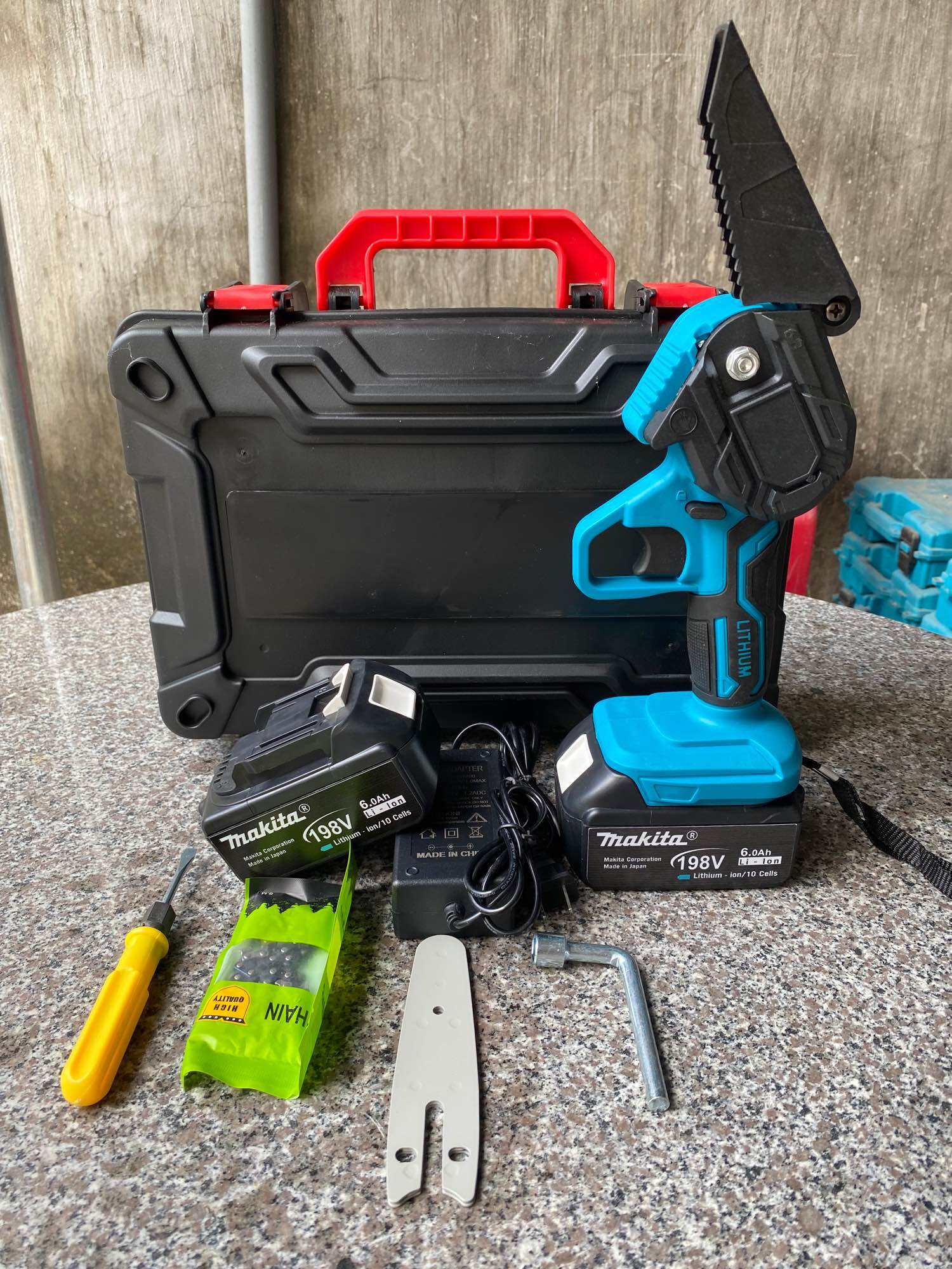 Máy cưa xích chạy pin Makita198V. Bảo hành 12 tháng