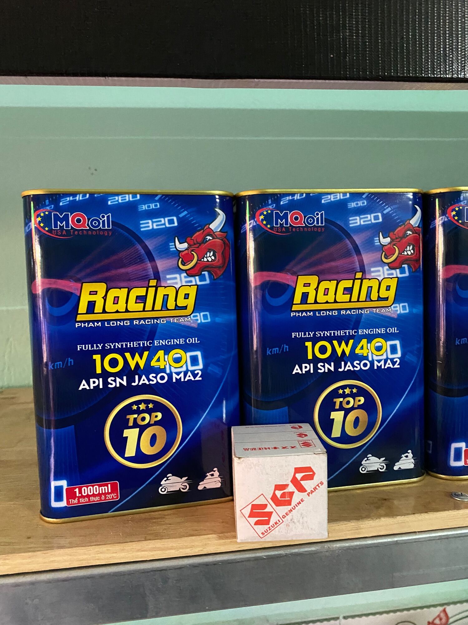 Nhớt phạm Long racing tặng lọc nhớt suzuki từ 1 lít đến 1lít 4
