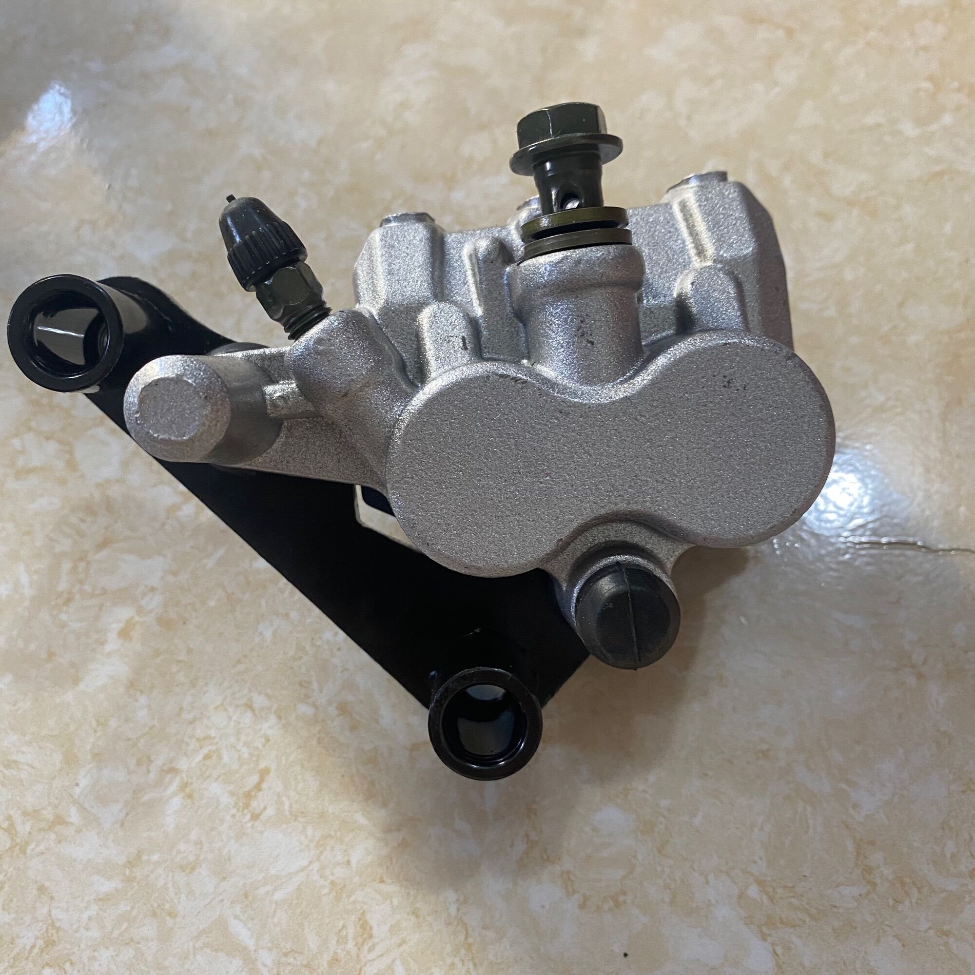 Bộ may ơ trước phanh đĩa xe ba gác
