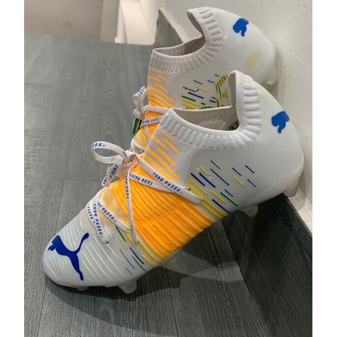 Giày đá bóng Fg Puma future trắng vàng