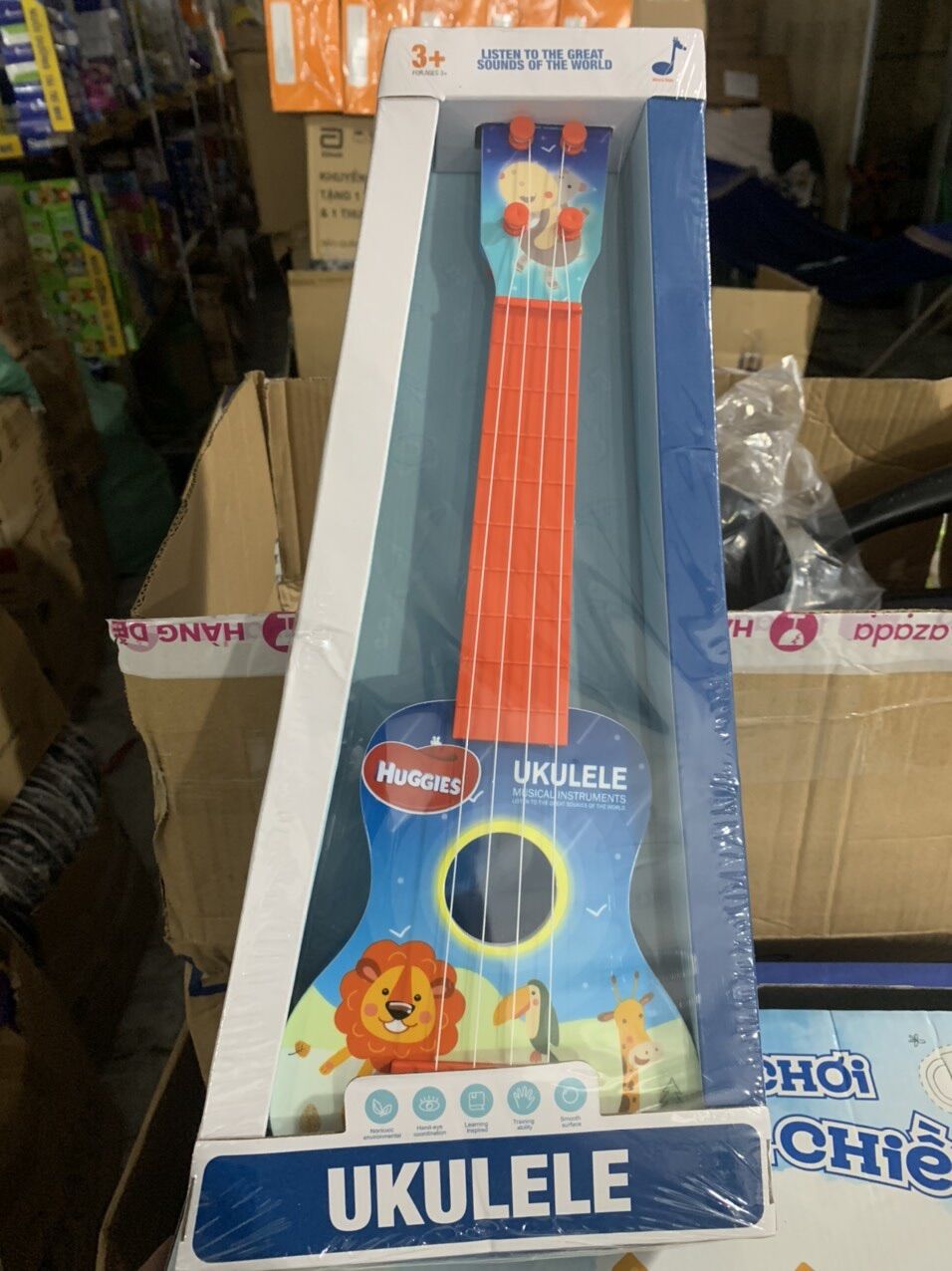 —- Đồ chơi đàn Ukulele- hkm tã