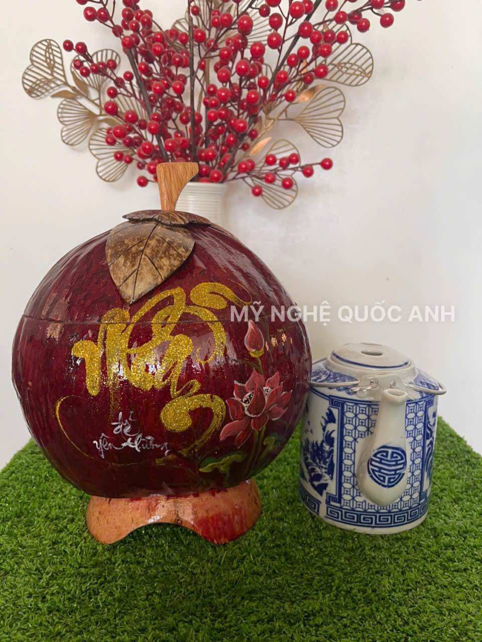 Vỏ dừa ủ ấm trà giử nhiệt vẽ thư pháp